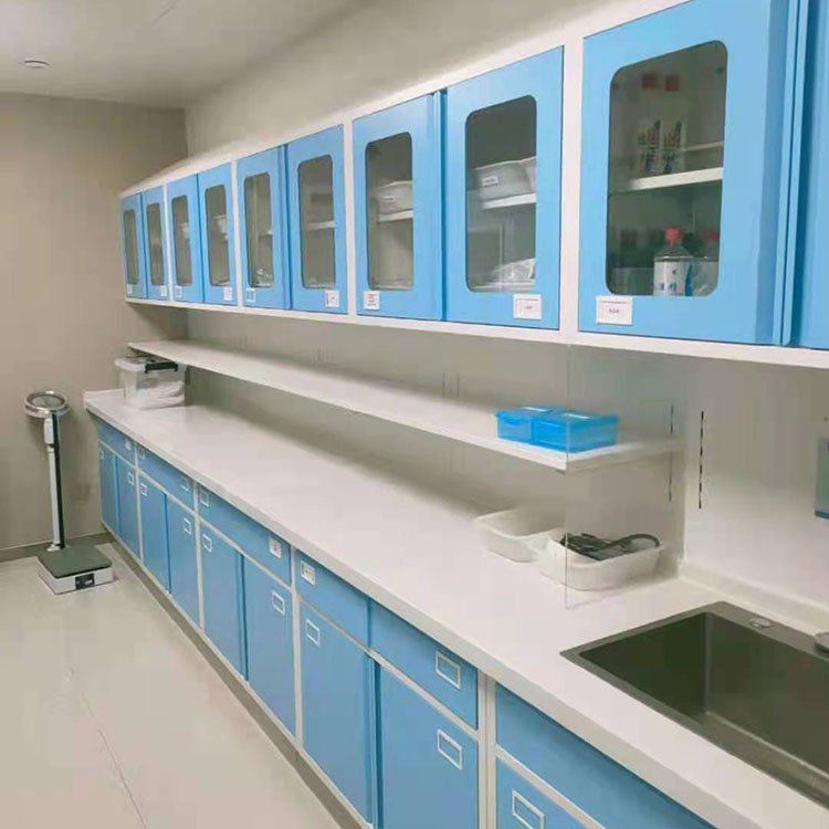 Boka Blue medical treatment cabinet with glass doors and countertop sink in a clinical room 